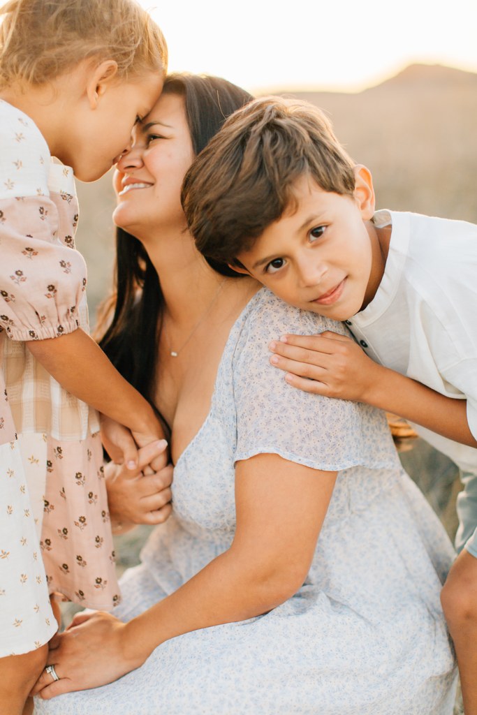 Adriana with both kids, nose to nose