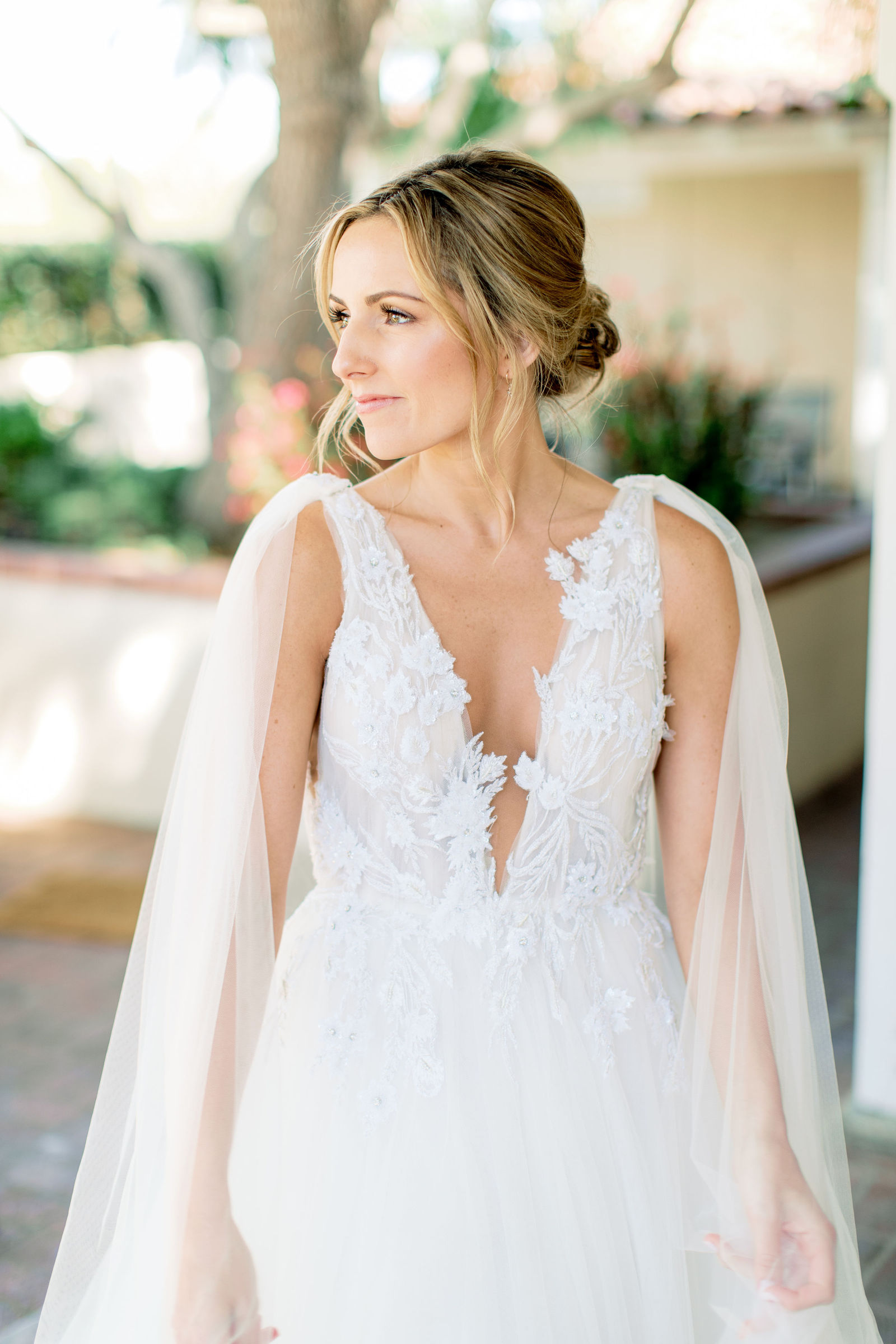 The lace cape gown, buttons down the back