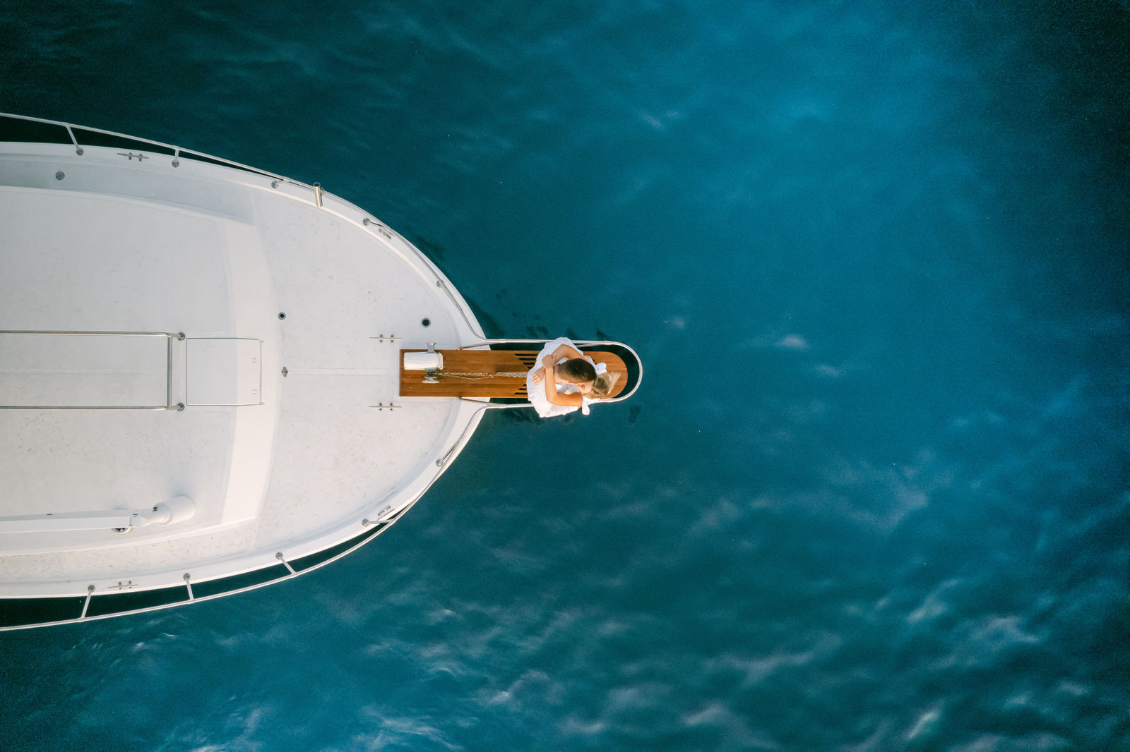 From above, Hanna on the bow over deep blue water off Palos Verdes