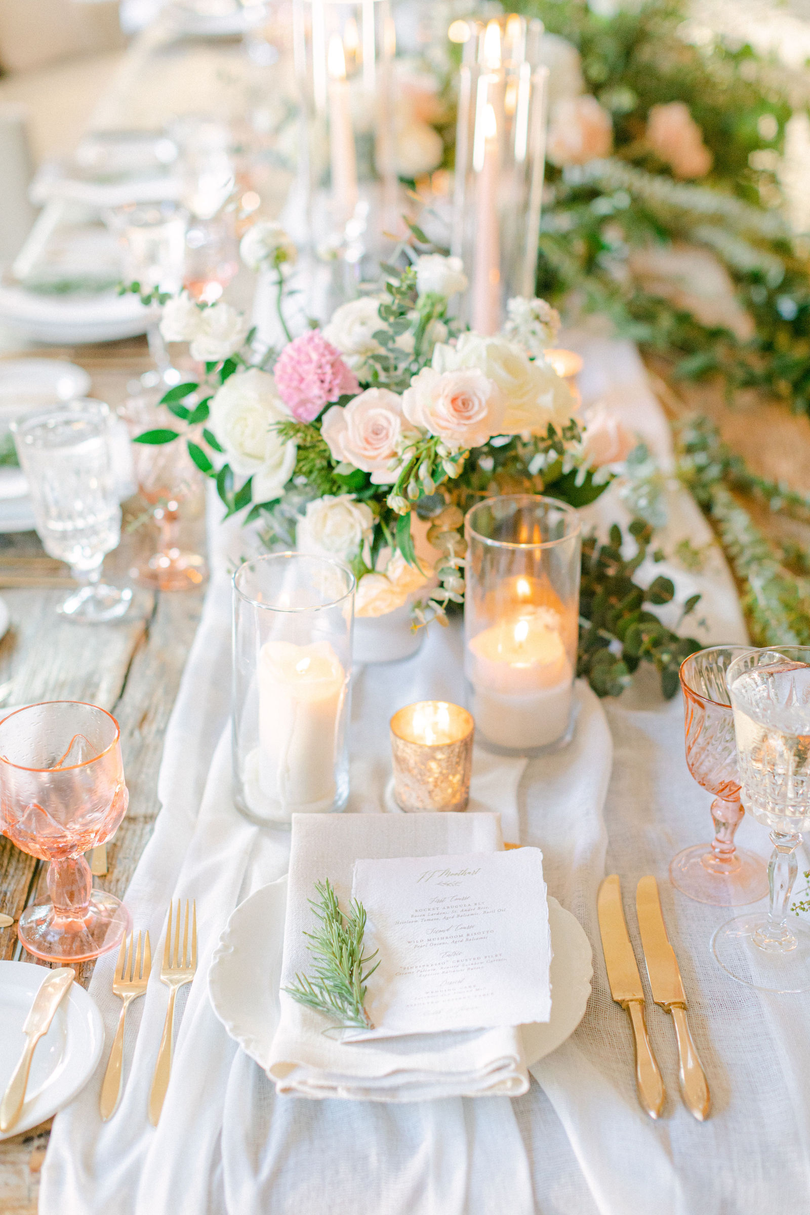 Tapers and blush garden roses down the reception table at The Ranch at Laguna Beach