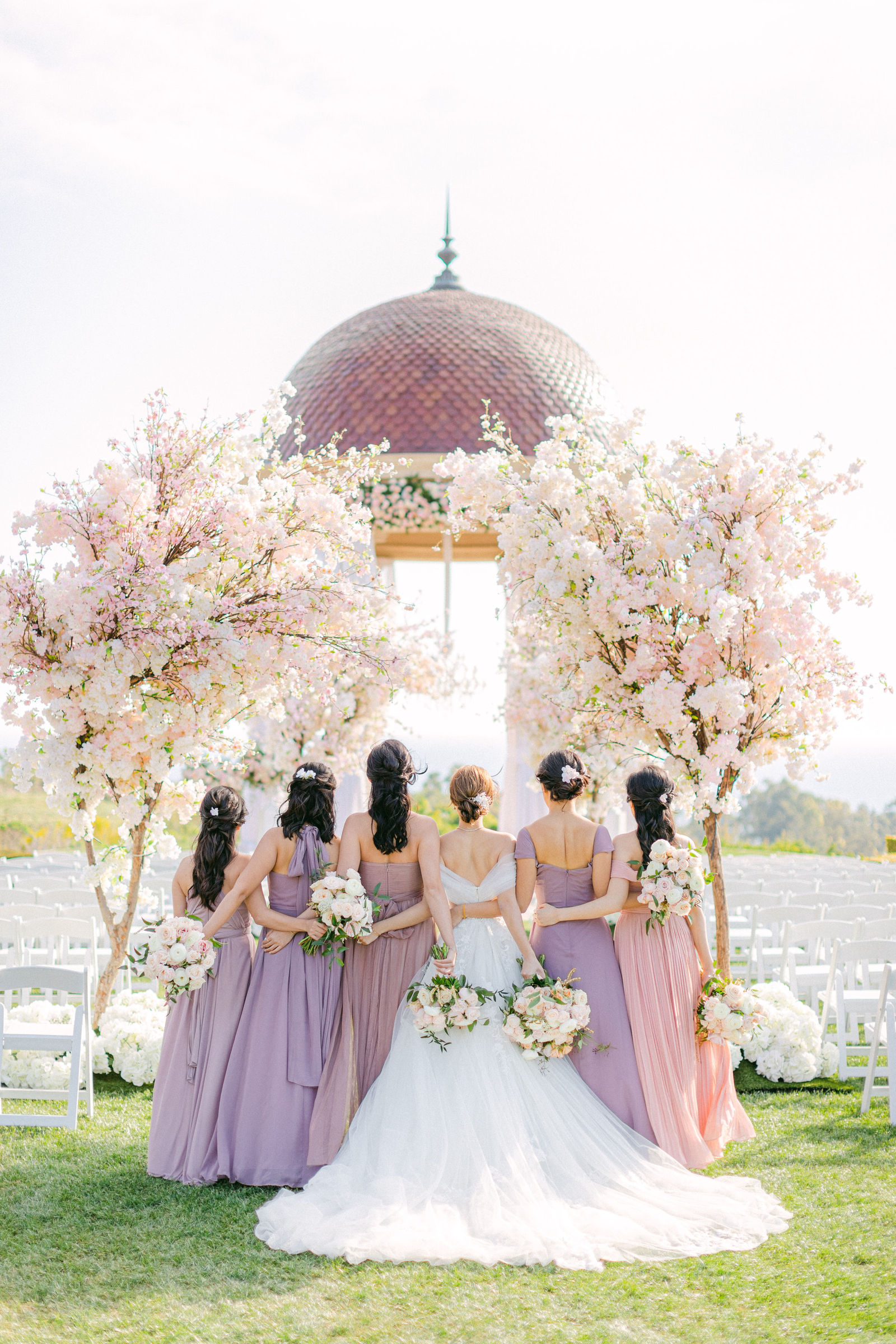 Bridesmaids in lavender at the Pelican Hill rotunda